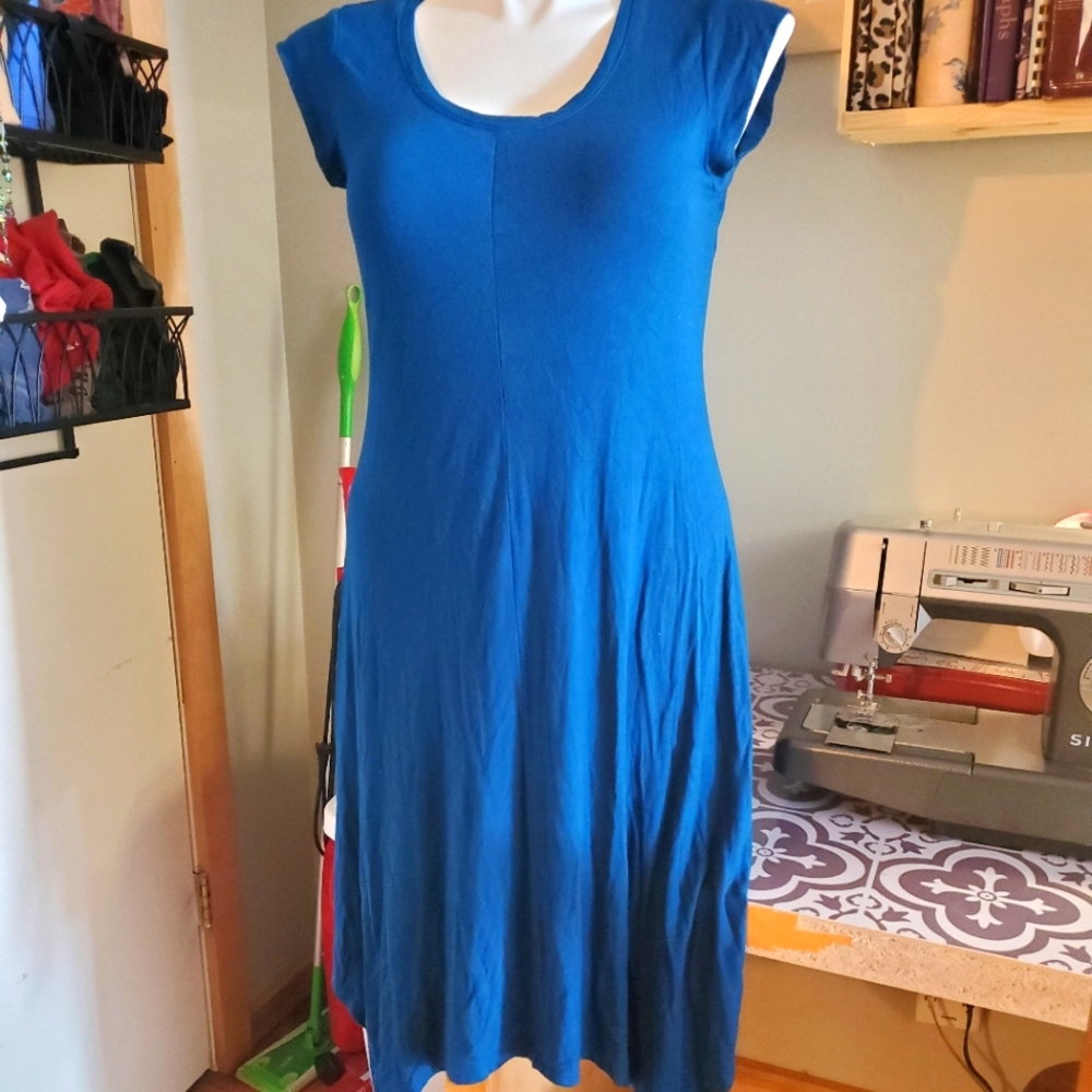 Blue cap sleeve dress with sharkbite hem